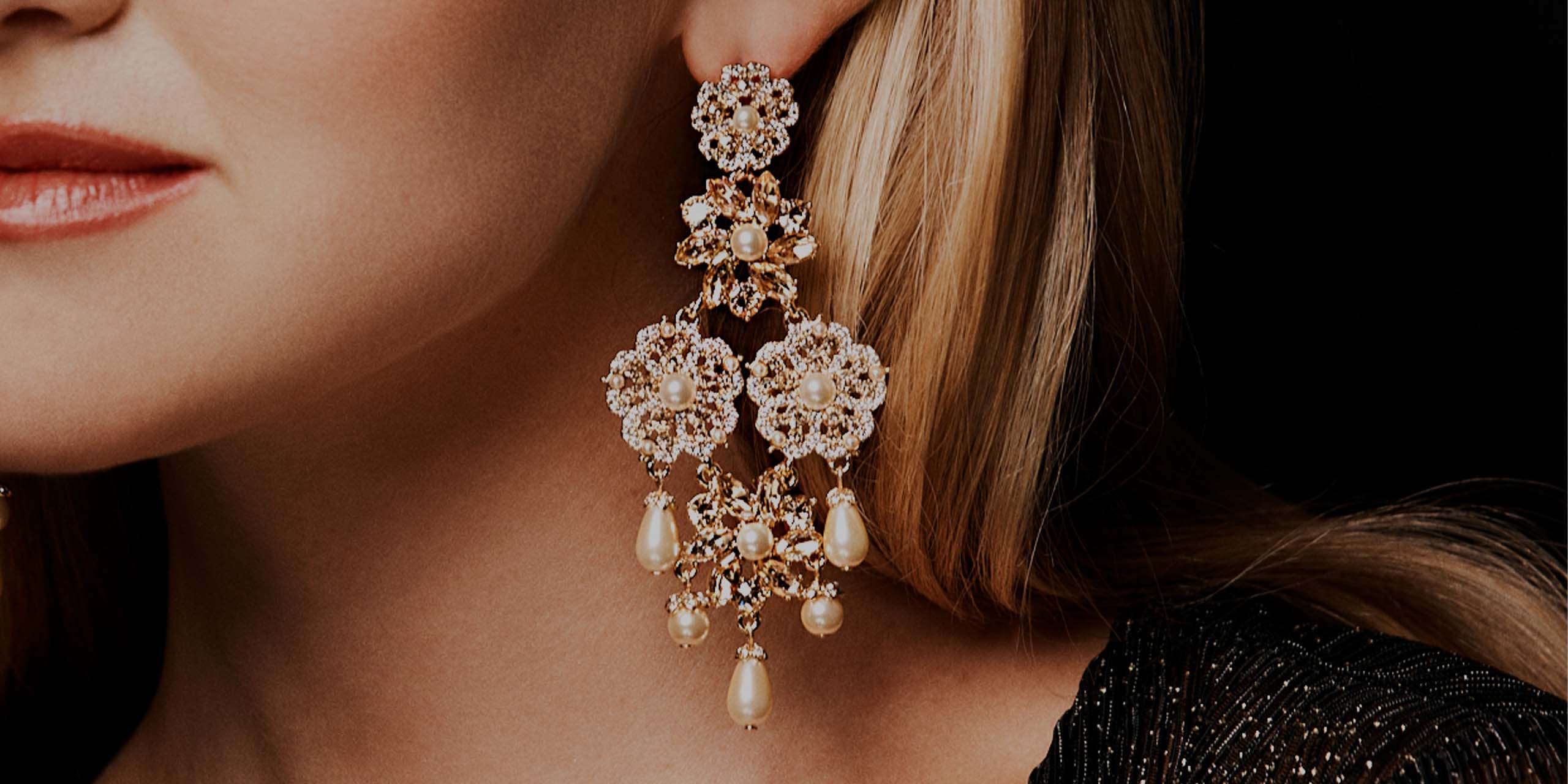 Photo of dangling earring, made by Marchesa